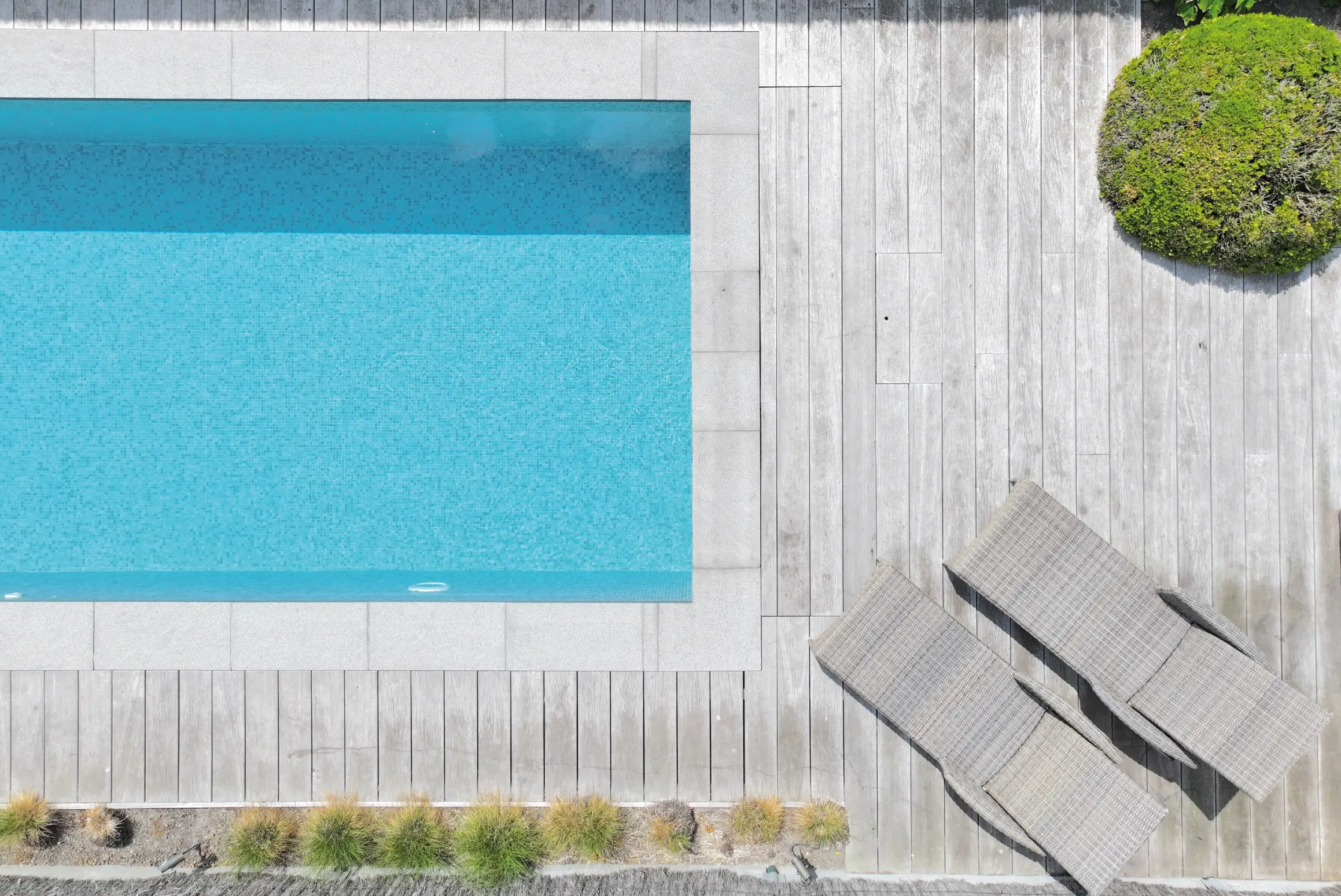 Pool with sun loungers